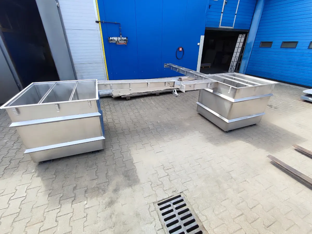 Tanks with stainless steel trough