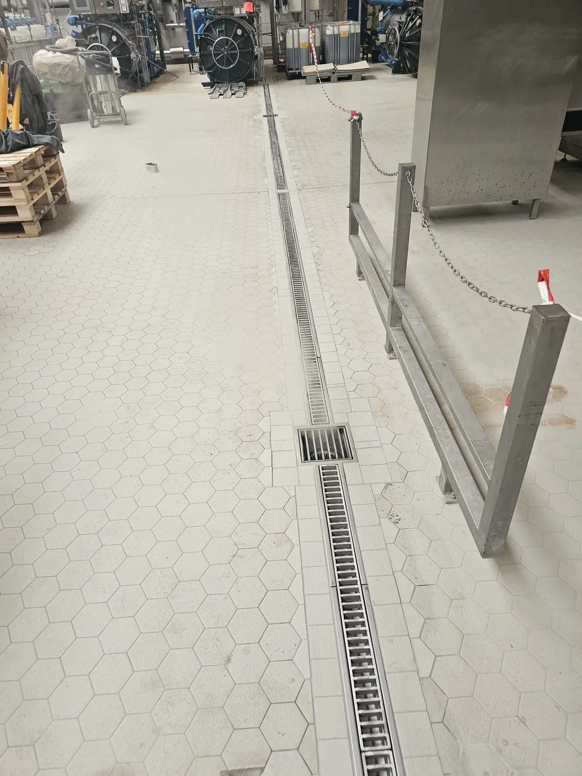 Renovation of Industrial Flooring with Ceramic Tiles and Installation of a Drainage Channel - Brewery